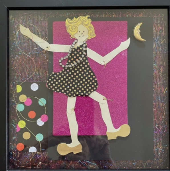 Moon Dancer by Judy Nilsen is mixed-media collage of a smiling, flapper-style woman with curly blonde hair dancing in a black polka dot dress and gold shoes. She wears a beaded necklace and poses with outstretched arms against a bright pink glitter background, surrounded by a black border with colorful scribbles, abstract circles, and a small crescent moon in the corner.