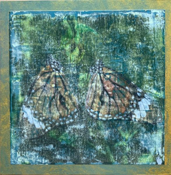 photography, mixed media on wood panel image of two moths