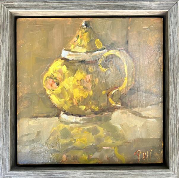 Image of antique tea pot in yellows