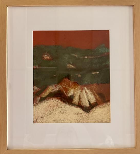 The Fan by Meg Ricks Framed abstract artwork in warm red, rust, and muted green tones, featuring layered, textured forms that suggest a reclining figure beneath a horizontal band of darker color.