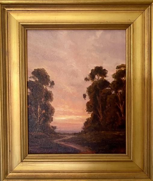 Winter Sunset by Ralph Waterhouse Framed landscape painting of a winding country path bordered by tall trees, illuminated by a warm pink and orange sunset sky.